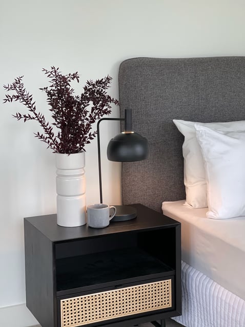 Adding a bedside lamp is a simple trick for your apartment styling